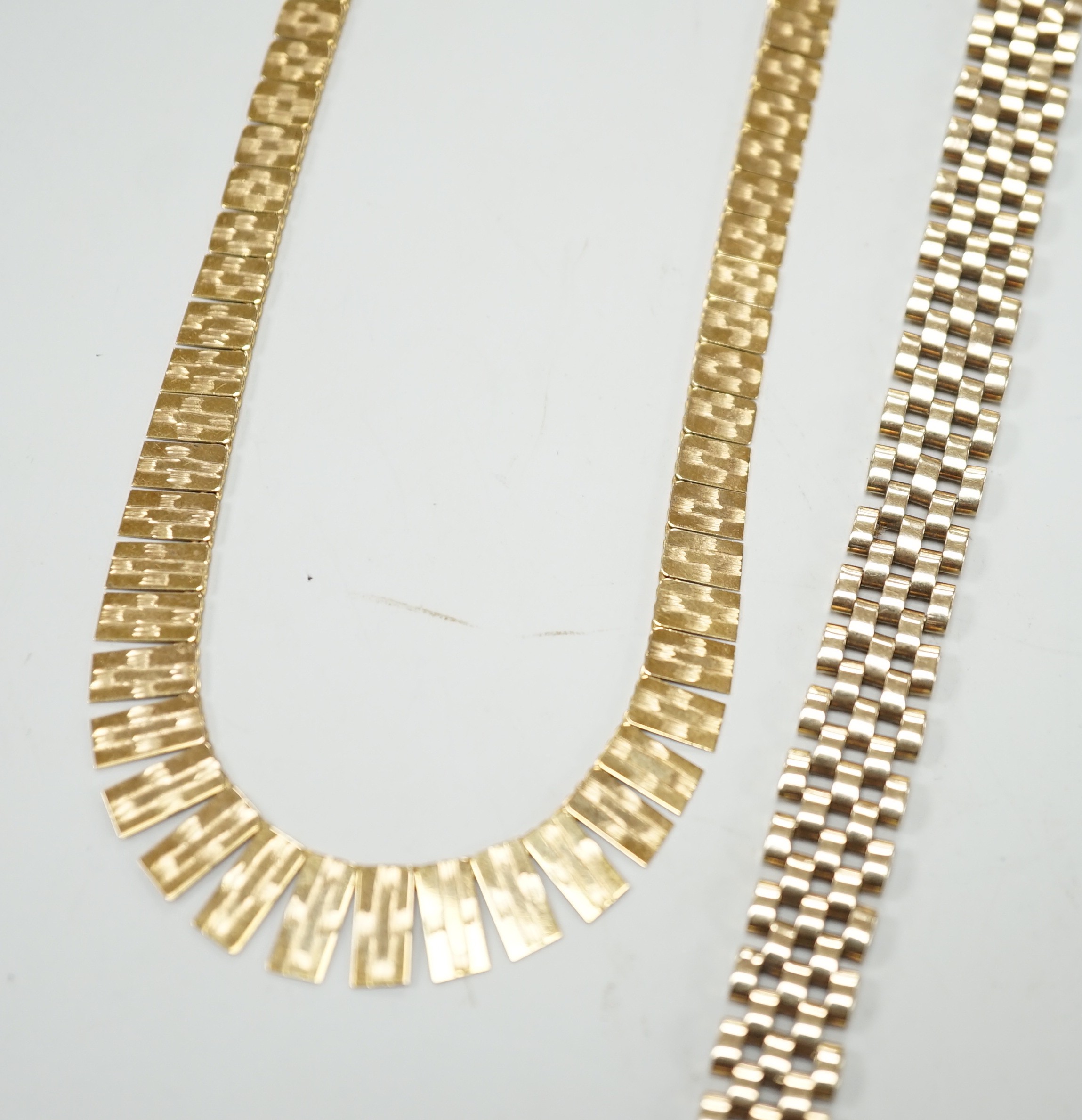 A modern 9ct gold fringe necklace, 44cm(a.f.) and a 9ct bracelet, 18.5cm, 33.2 grams.